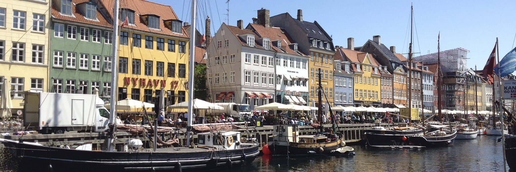 A bustling harbor in Copenhagen, Denmark. 