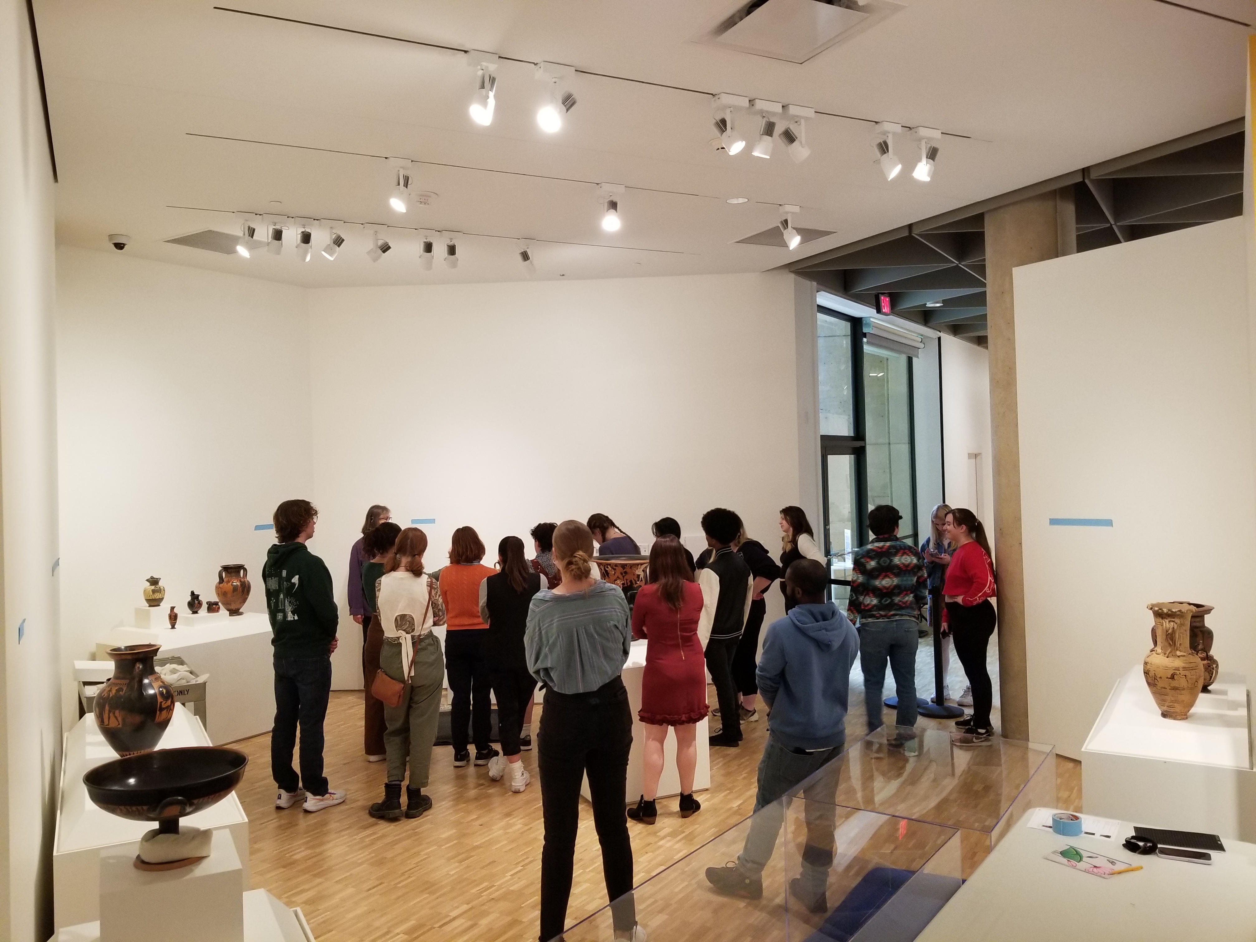 ASURE students installing the exhibition at the Eskenazi Museum of Art
